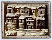carving of roman houses