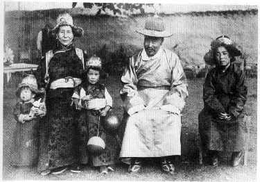 Dalai Lama as a child, with his family
